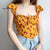 Women Sweetheart Tie Neck Top With Hollow Out Back In Yellow Floral Print