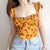 Women Sweetheart Tie Neck Top With Hollow Out Back In Yellow Floral Print