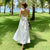 White Satin Spaghetti Strap Dress Women Sexy Summer Beach Dress Holiday Sleeveless Bow Lace Up Bandage Elegant Backless Dresses