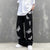 XXnanz tide ins popular logo hip-hop retro butterfly print wash jeans trousers for men and women in the streets